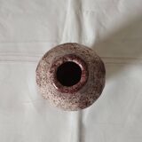 White ceramic vase with brown speckles