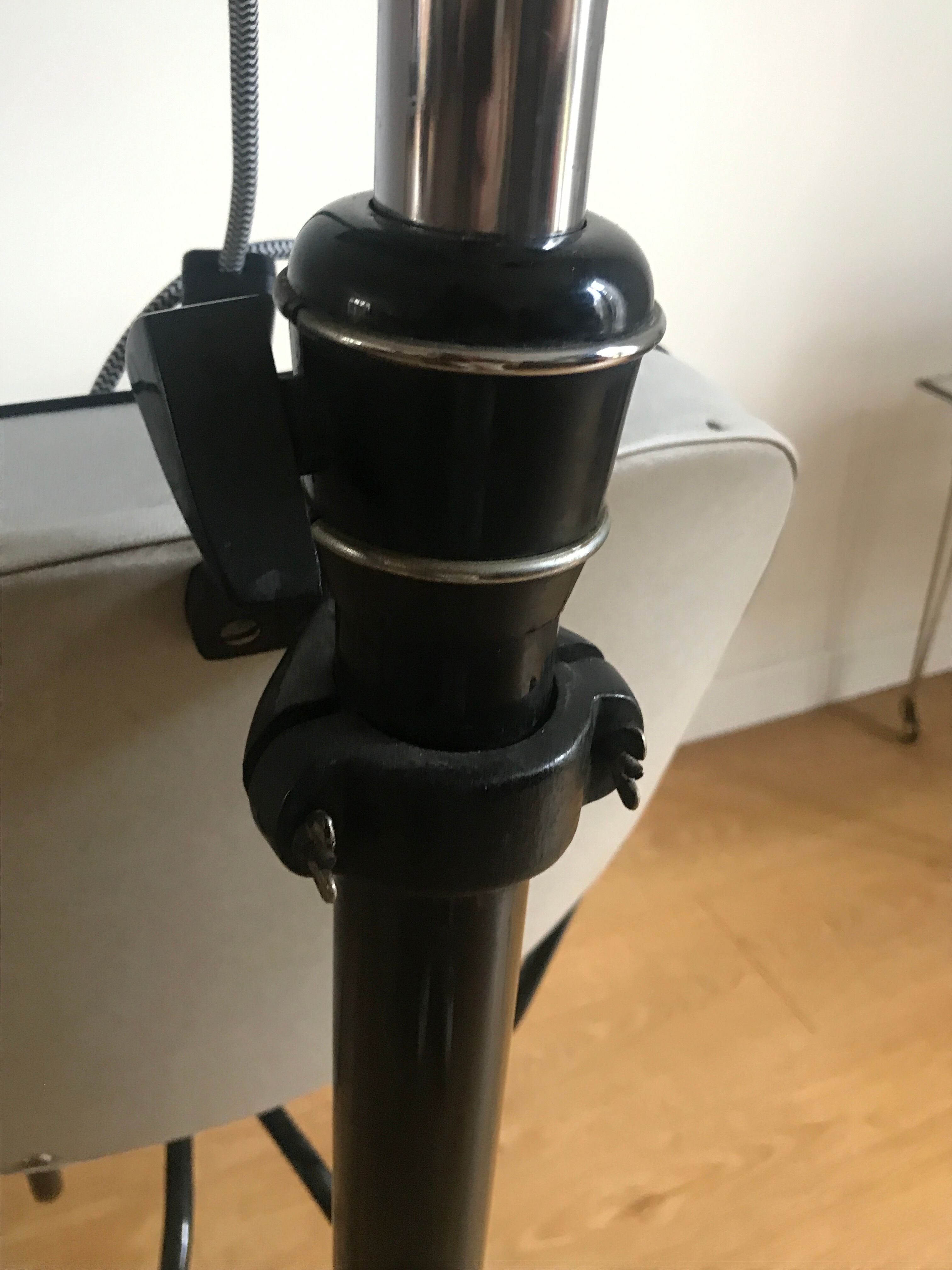 Vintage hairdresser's armchair with helmet transformed into a lamp