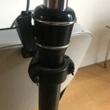 Vintage hairdresser's armchair with helmet transformed into a lamp