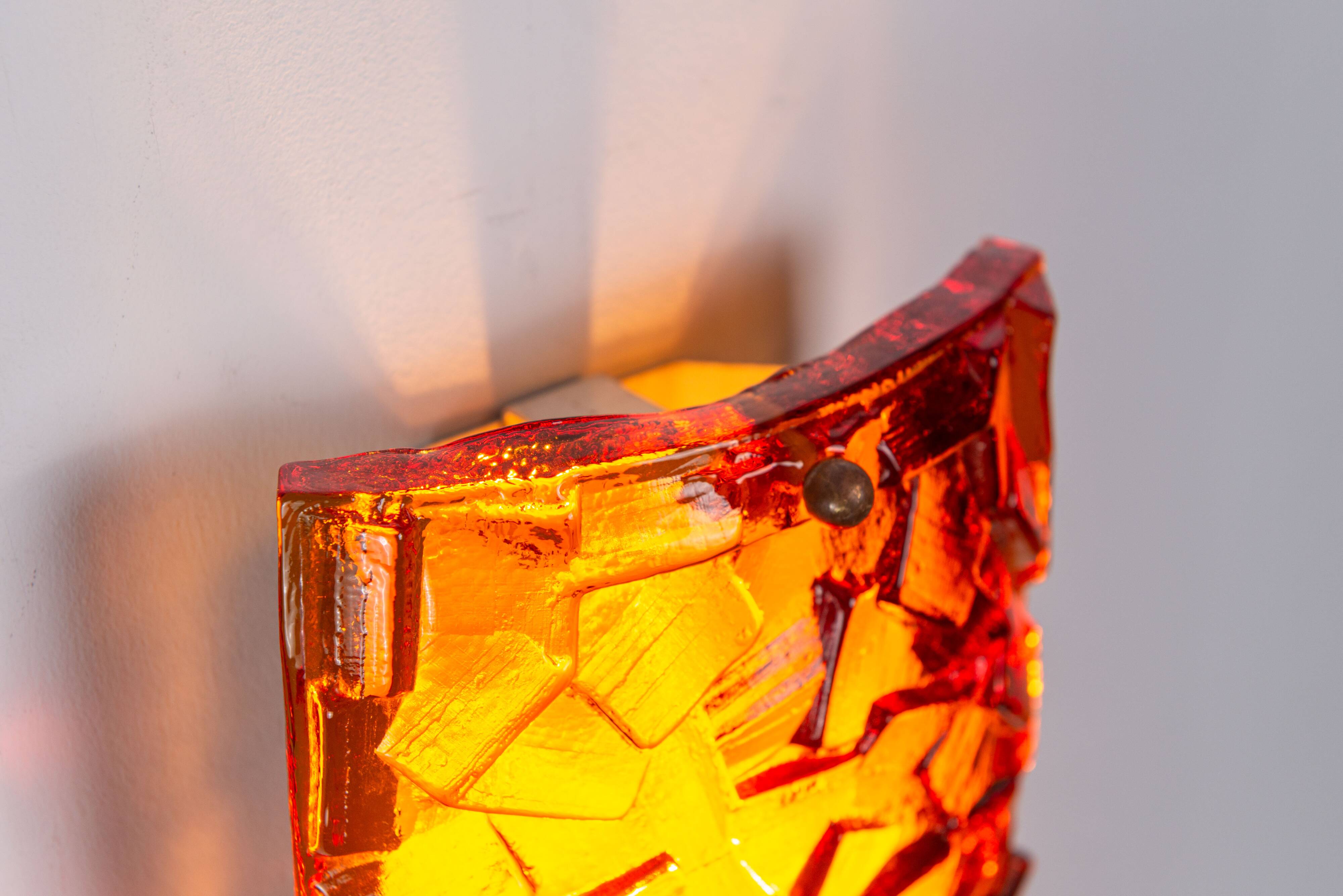 Vitrika Nybro amber coloured wall lamps