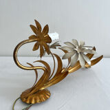Vintage Hollywood Regency gold metal leaf wall sconce.