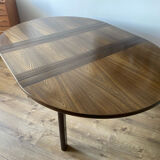 Table with an oak veneer and butterfly extension.