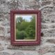 Vintage wall mirror in carved wood, burgundy and gold – Art Deco style – H4