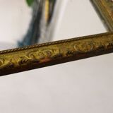 Large elongated gilded mirror