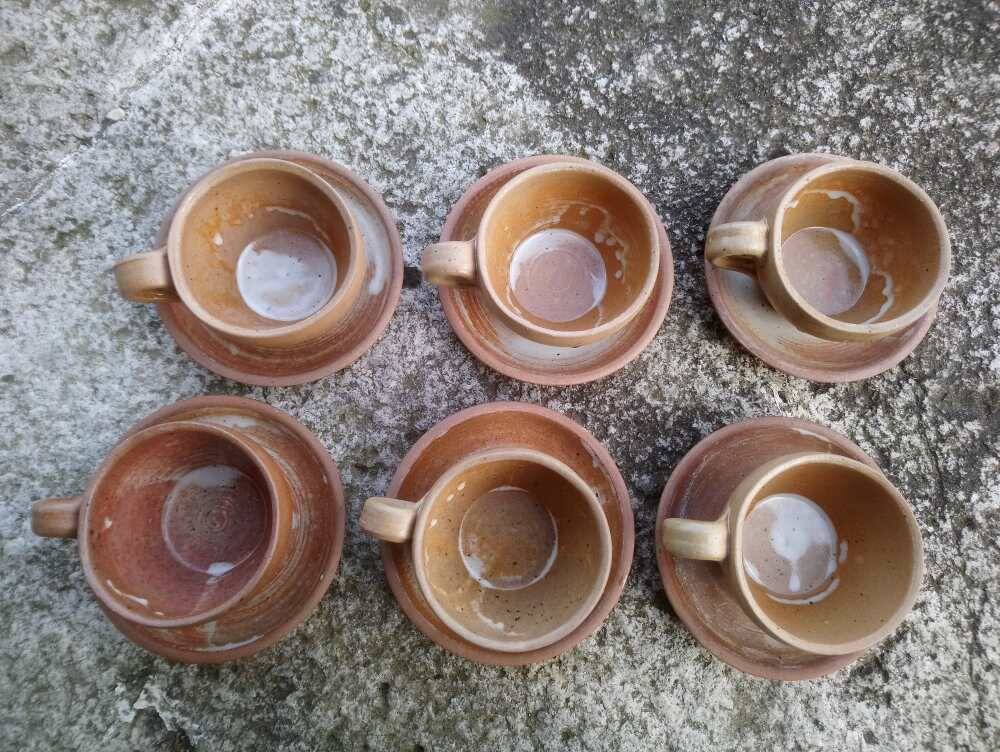 6 stoneware coffee cups and saucers