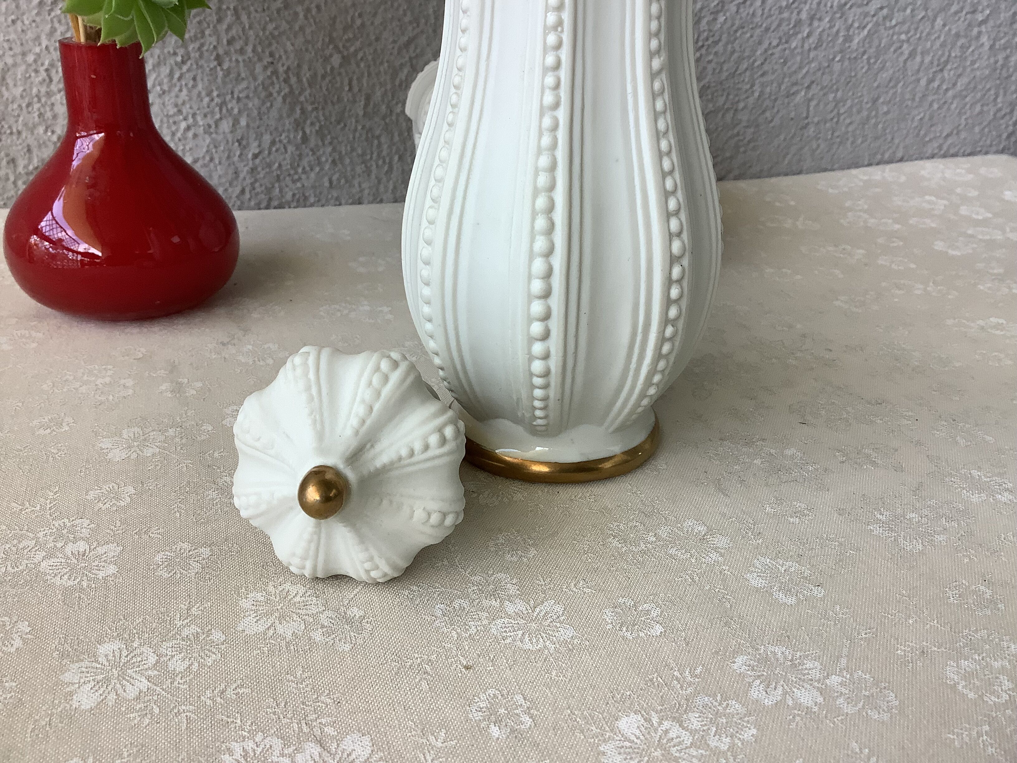 3 porcelain biscuit bottles from La Couleuvre art deco