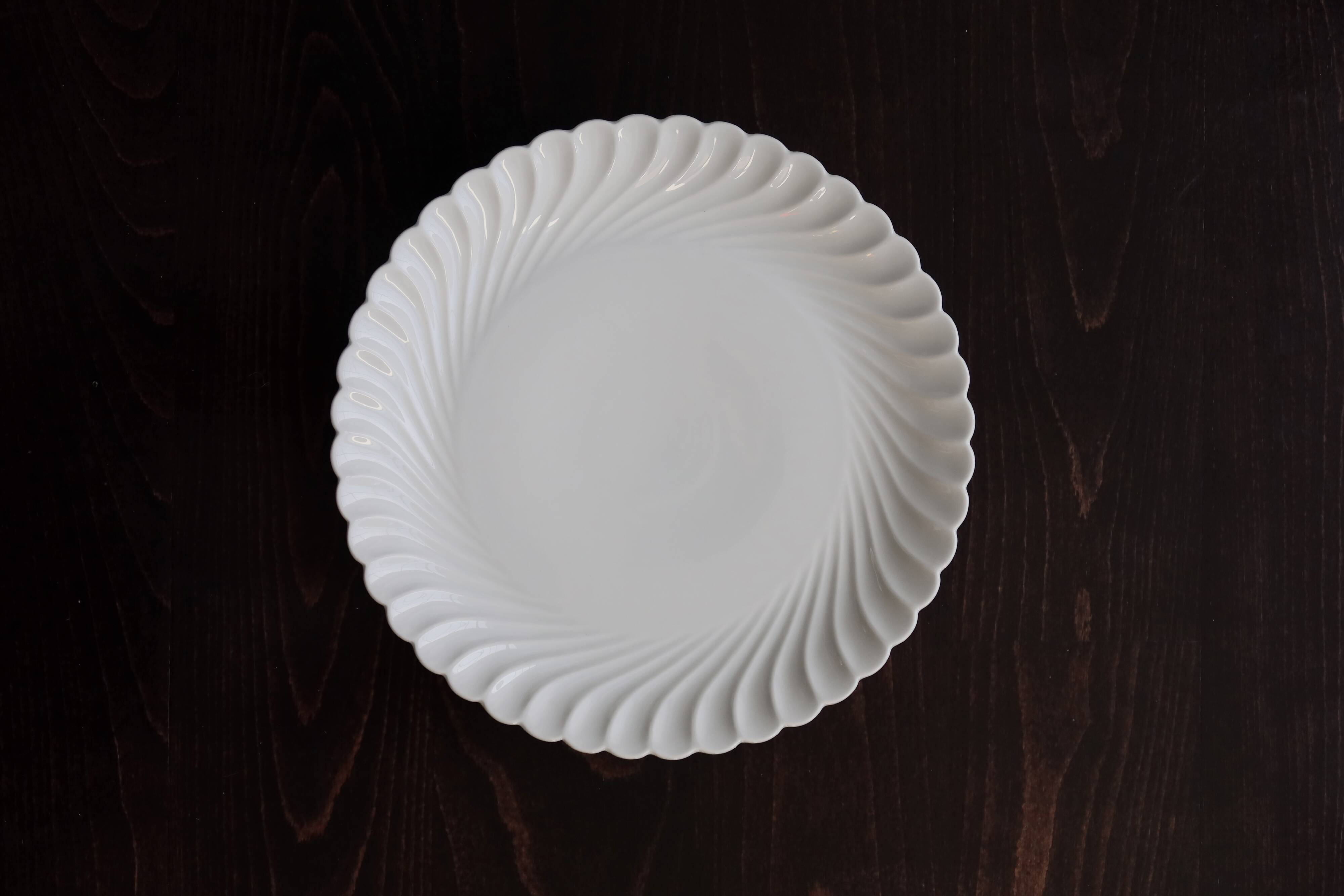 Vintage round serving dish in white porcelain with twists by Limoges Haviland