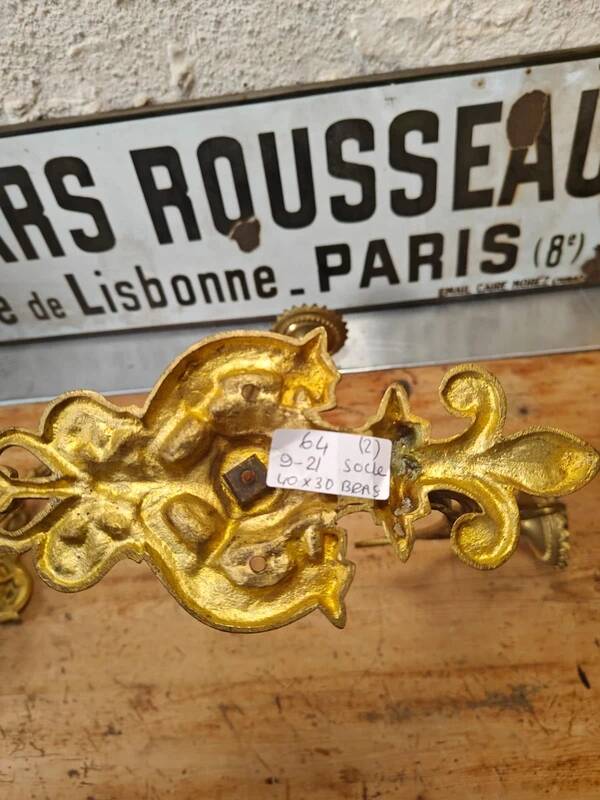 Set of two large antique brass candle wall sconces.