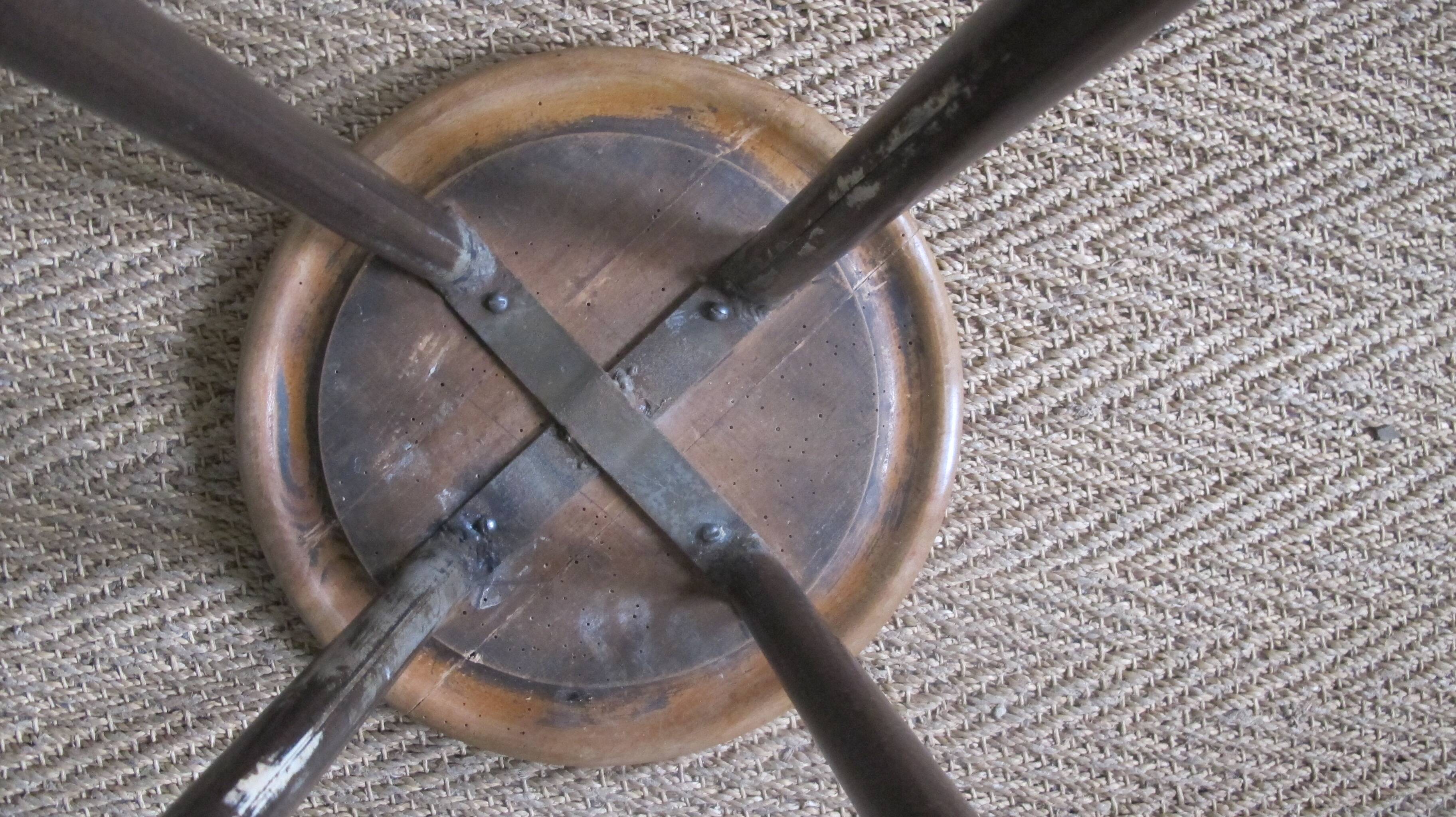 high factory stool made of wood and metal