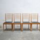 Series of 4 vintage chairs in wood and skaï