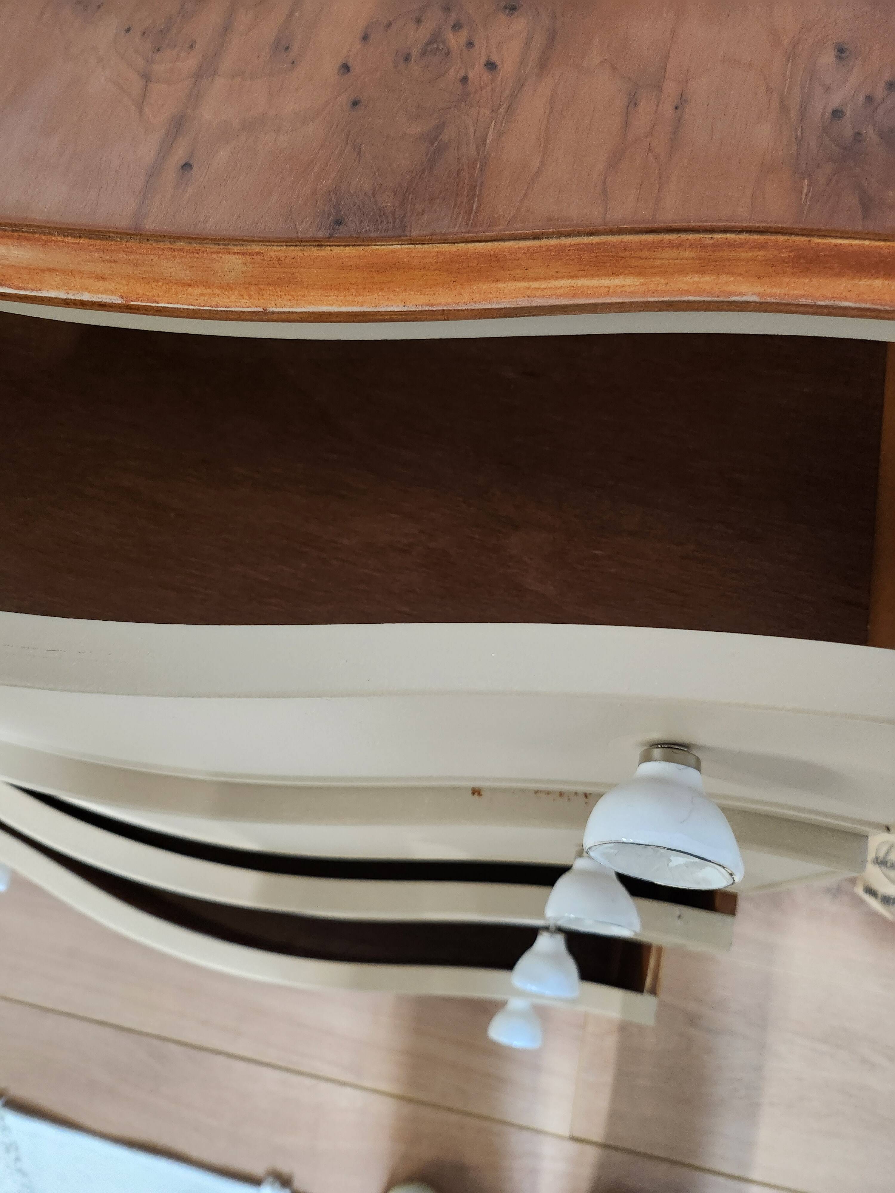 Chest of drawers with rounded front