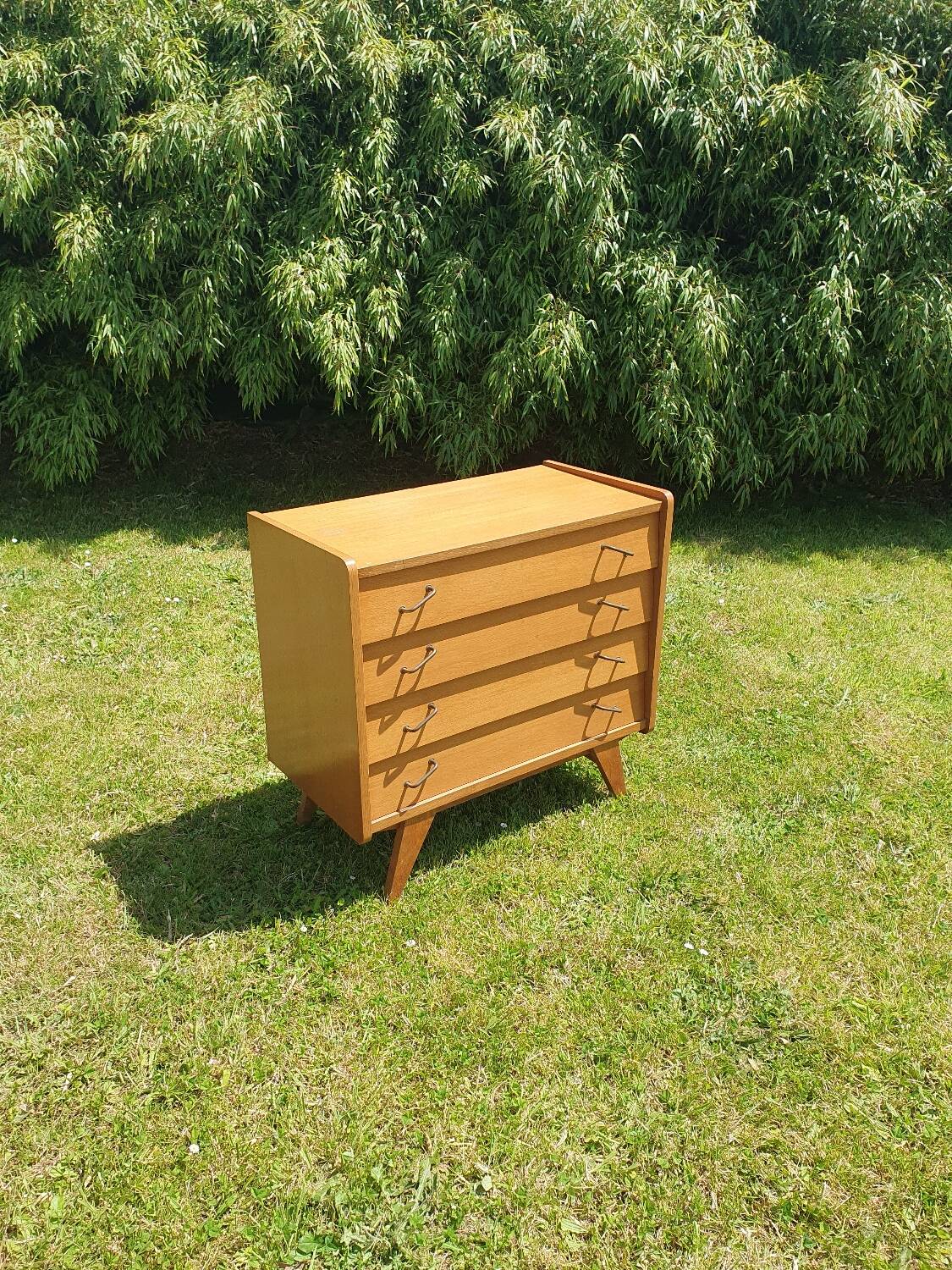 Compass feet chest of drawers