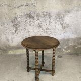 Vintage gueridon with beaded wooden legs.