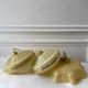 Pair of suspensions in yellow Clichy glass and golden border 40s-50s