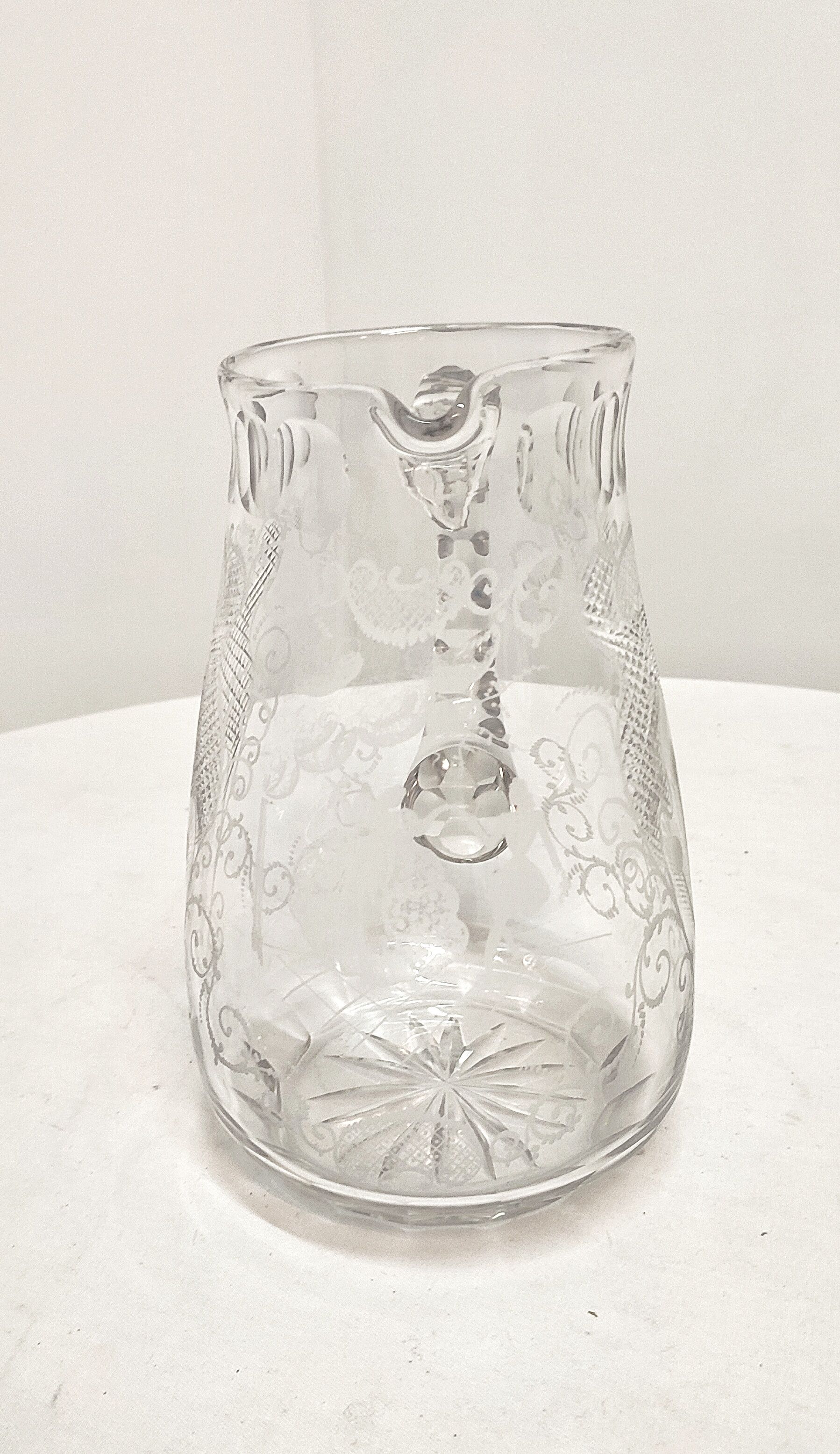 Hand-carved glass jug. France, 1950s.