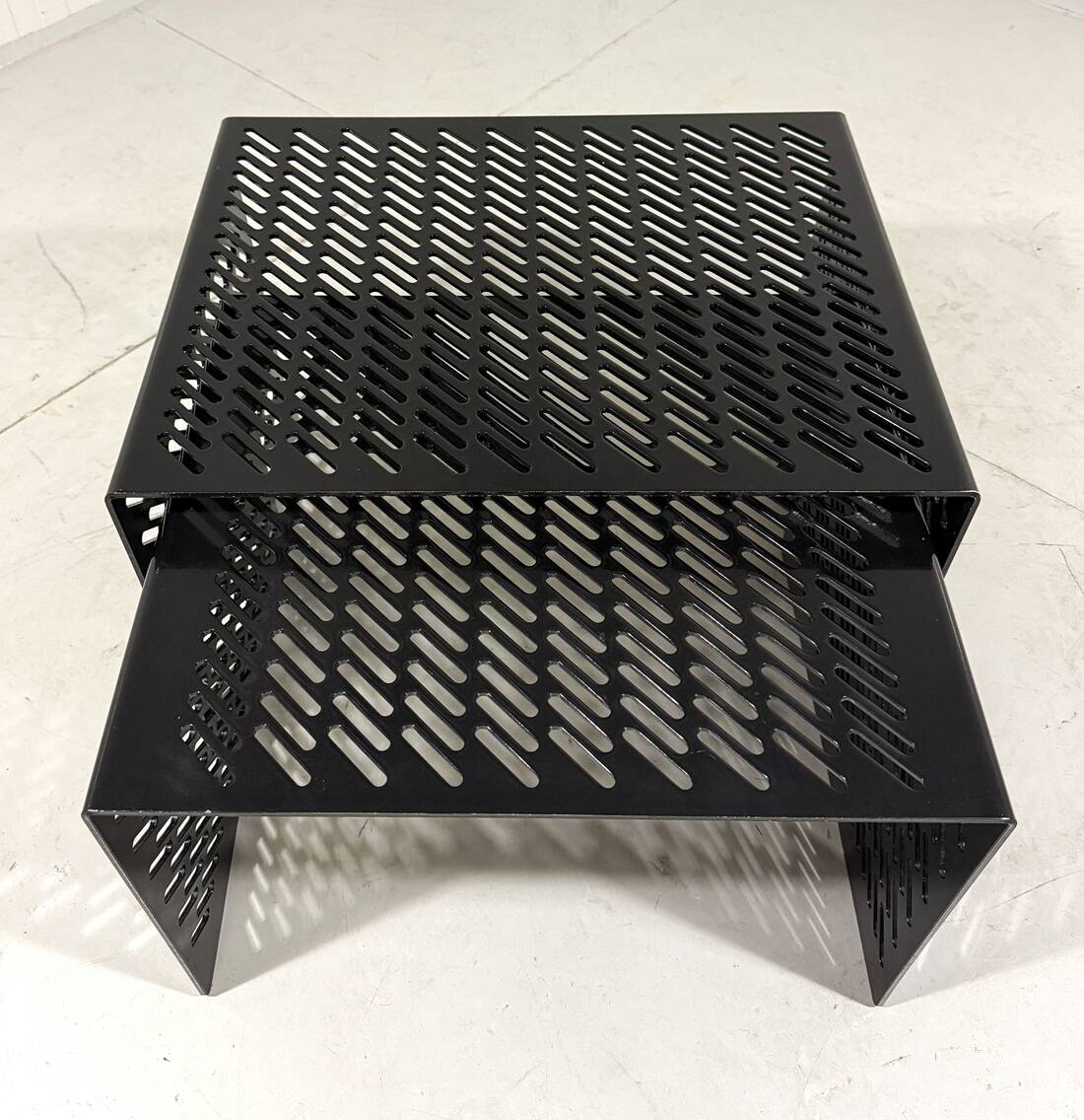 Black perforated steel nesting tables Italy 1980’s