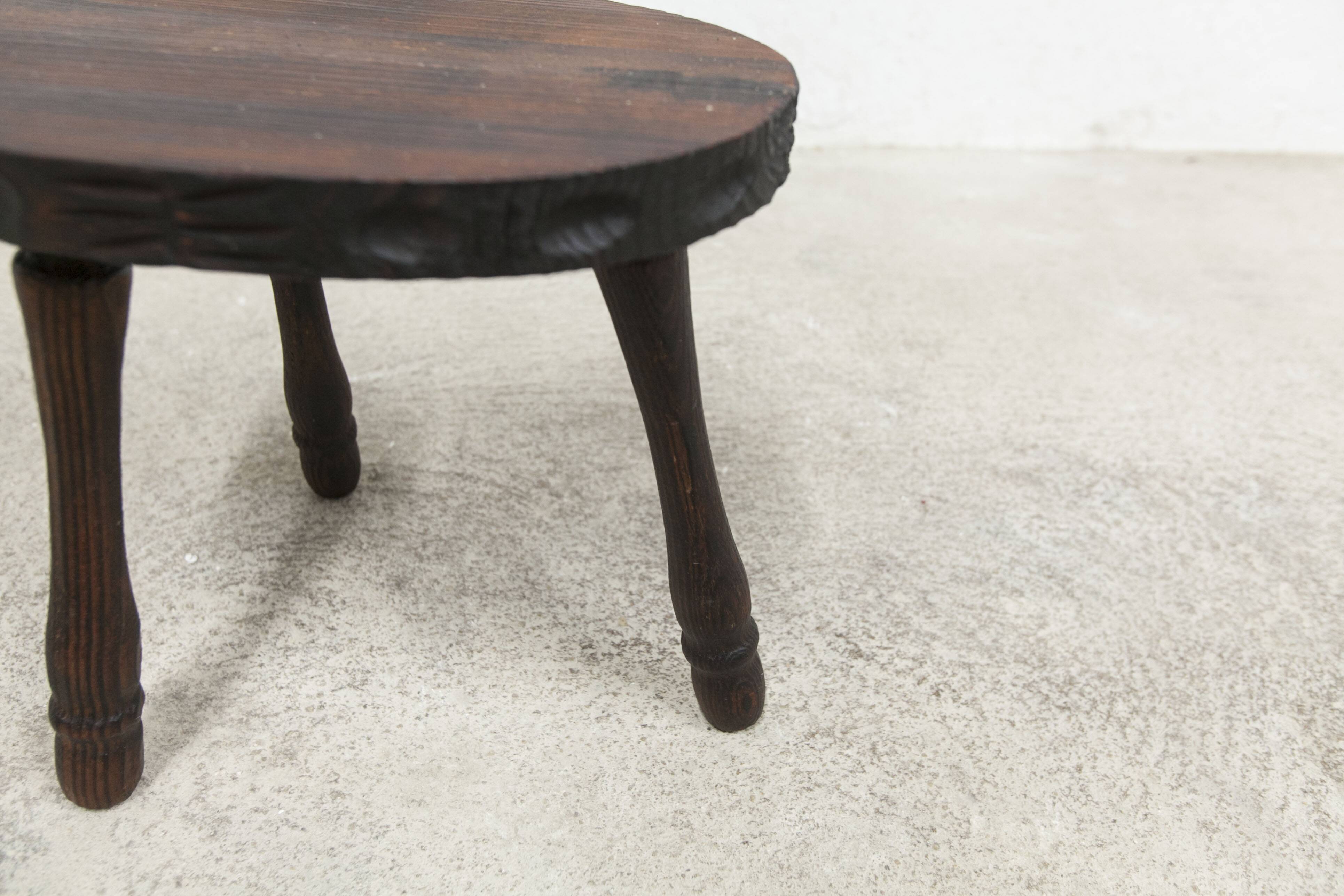 Low brutalist solid wood stool 1950