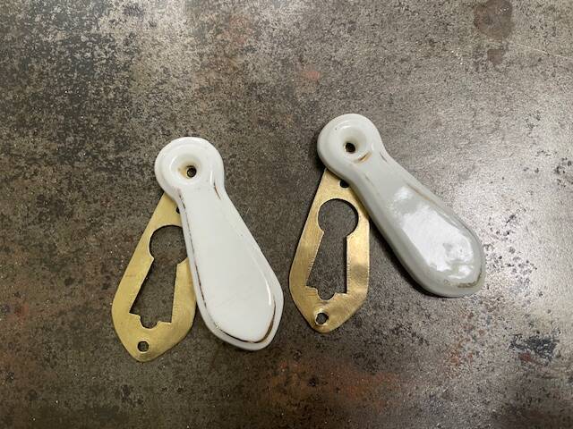 pair of antique brass door lock entries and porcelain cover art d