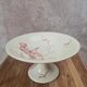 Large footed compote Gien model Iris with red floral decoration.