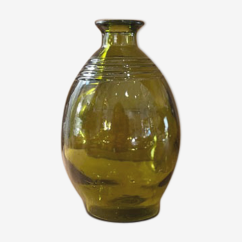 Round green glass bottle or vial