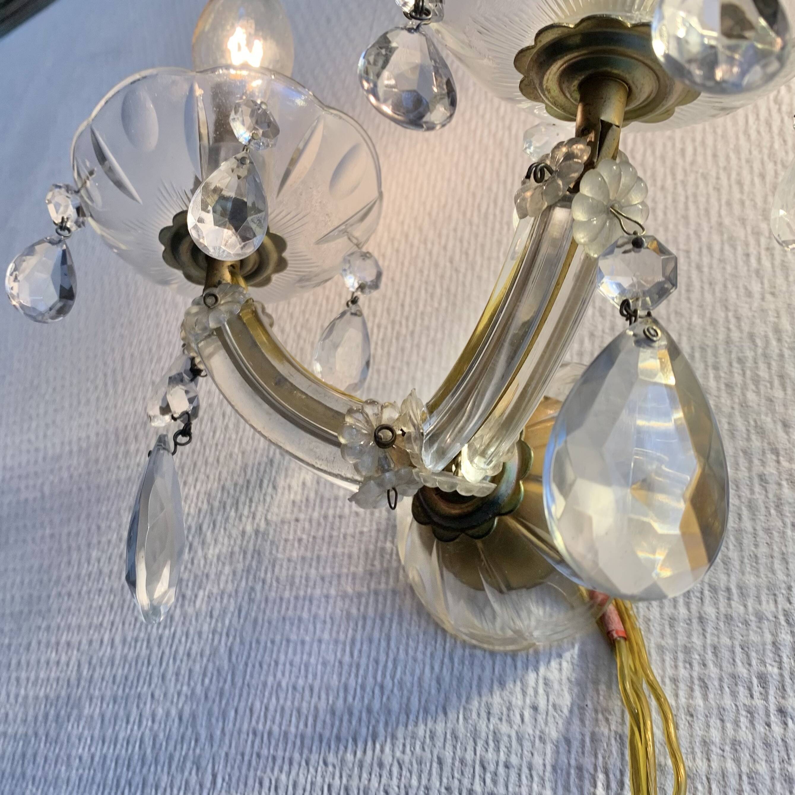 "Pair of vintage glass and brass wall sconces with tassels