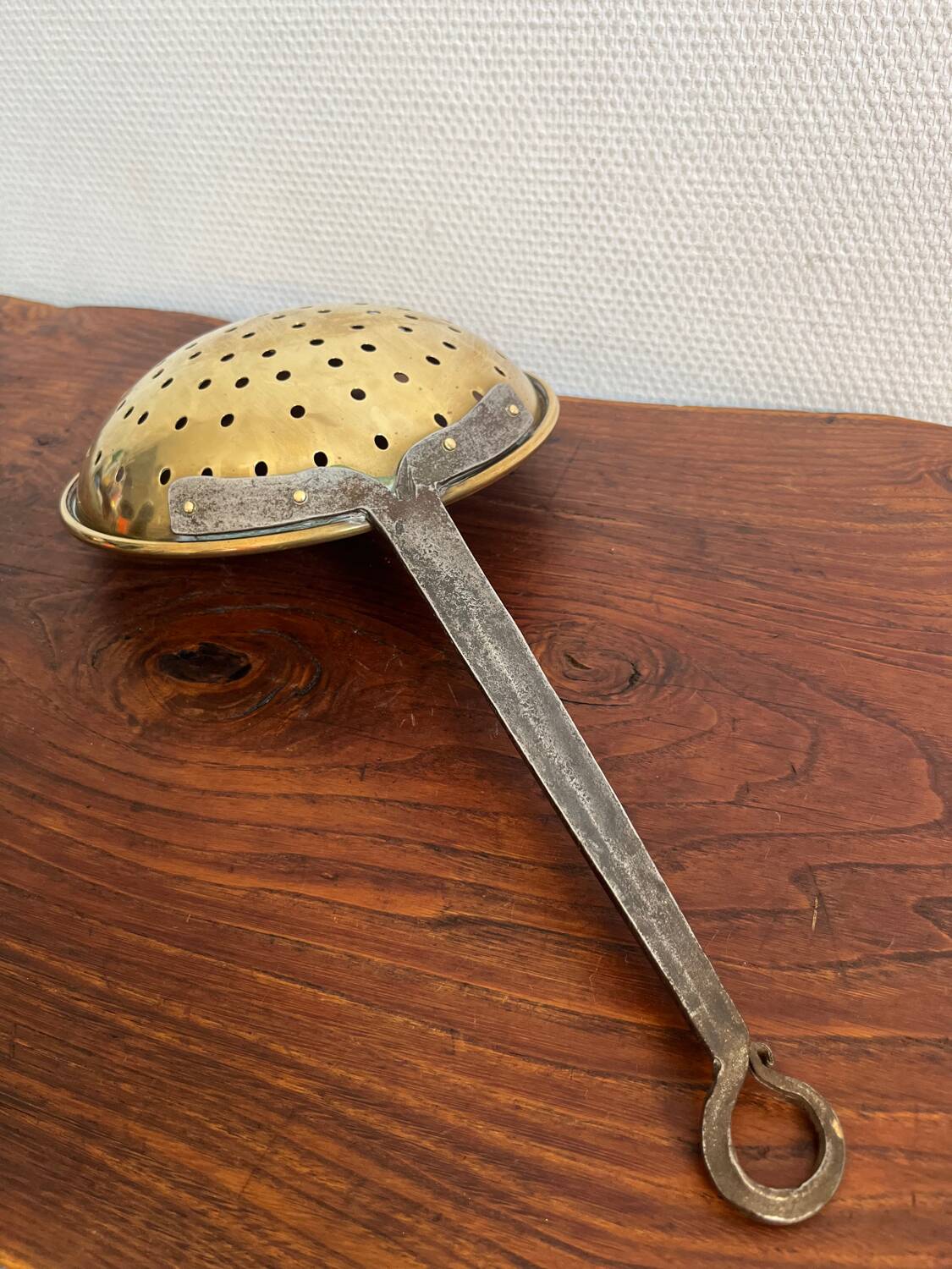 Large skimmer in brass and wrought iron, early 20th century