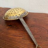 Large skimmer in brass and wrought iron, early 20th century