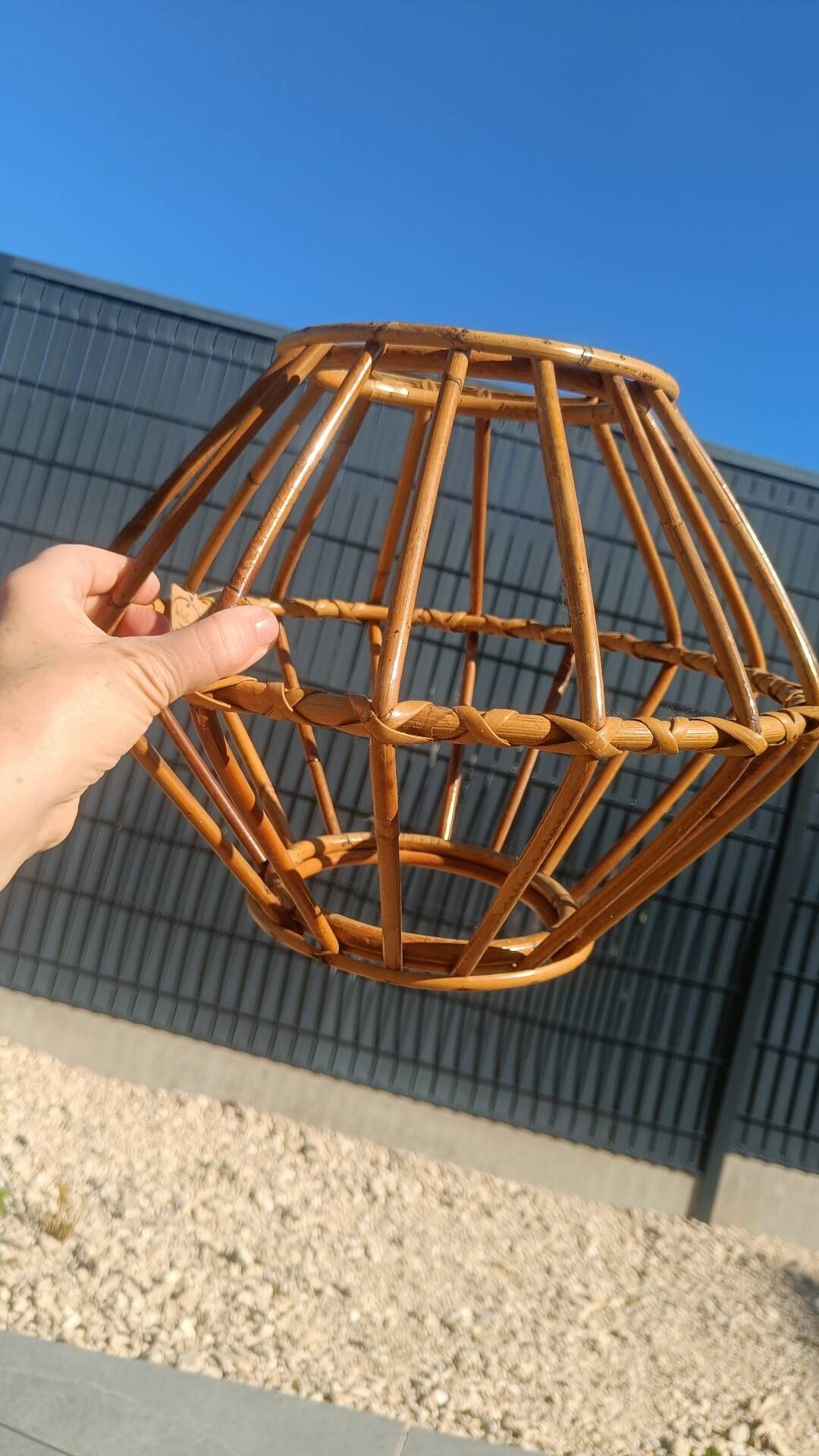 Vintage rattan and bamboo pendant light with removable shade.
