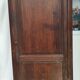 Bonnetière man standing cabinet a door