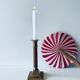 Old candle holder in brass and wood