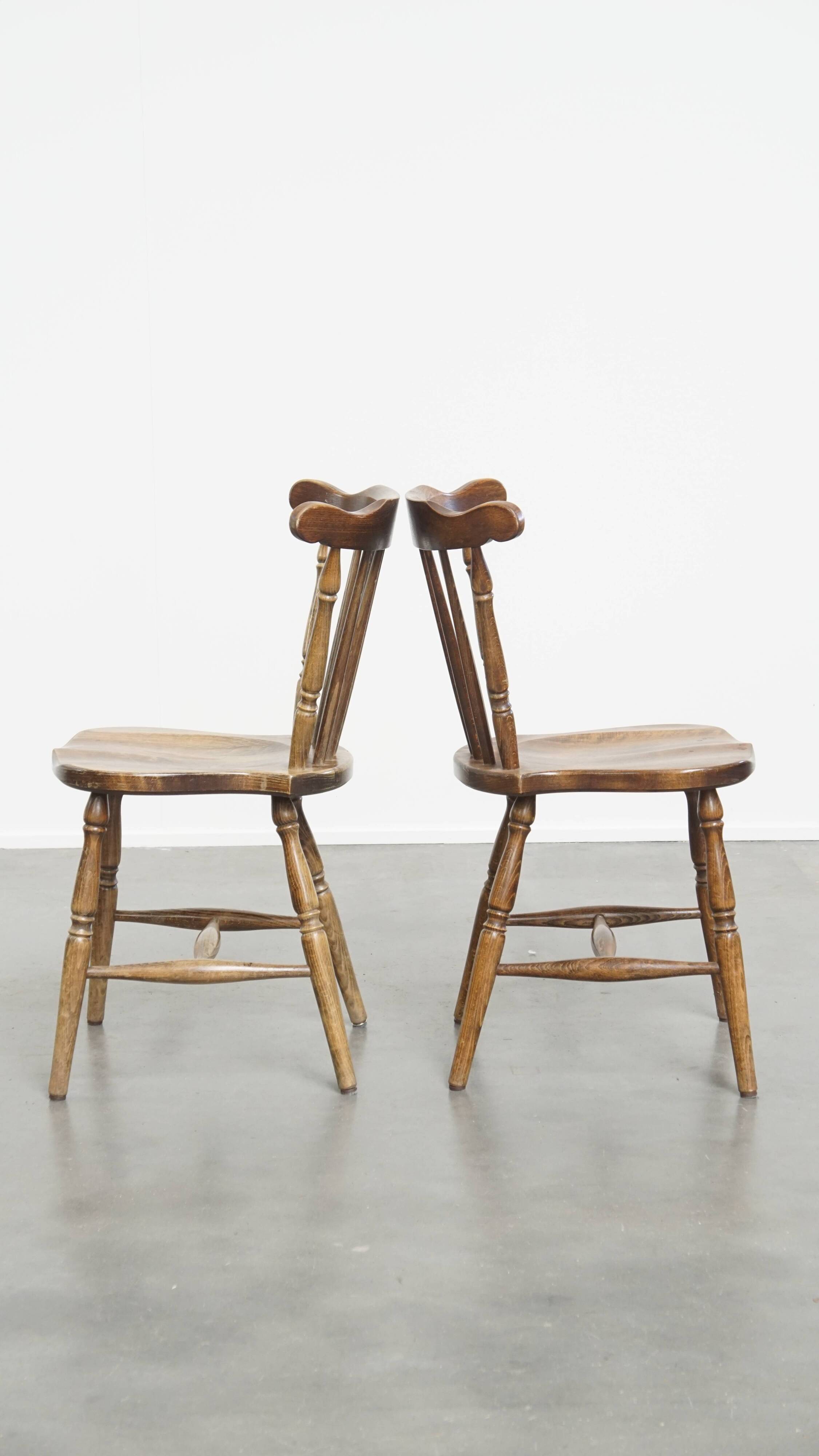 Set of 8 antique wooden spindle chairs