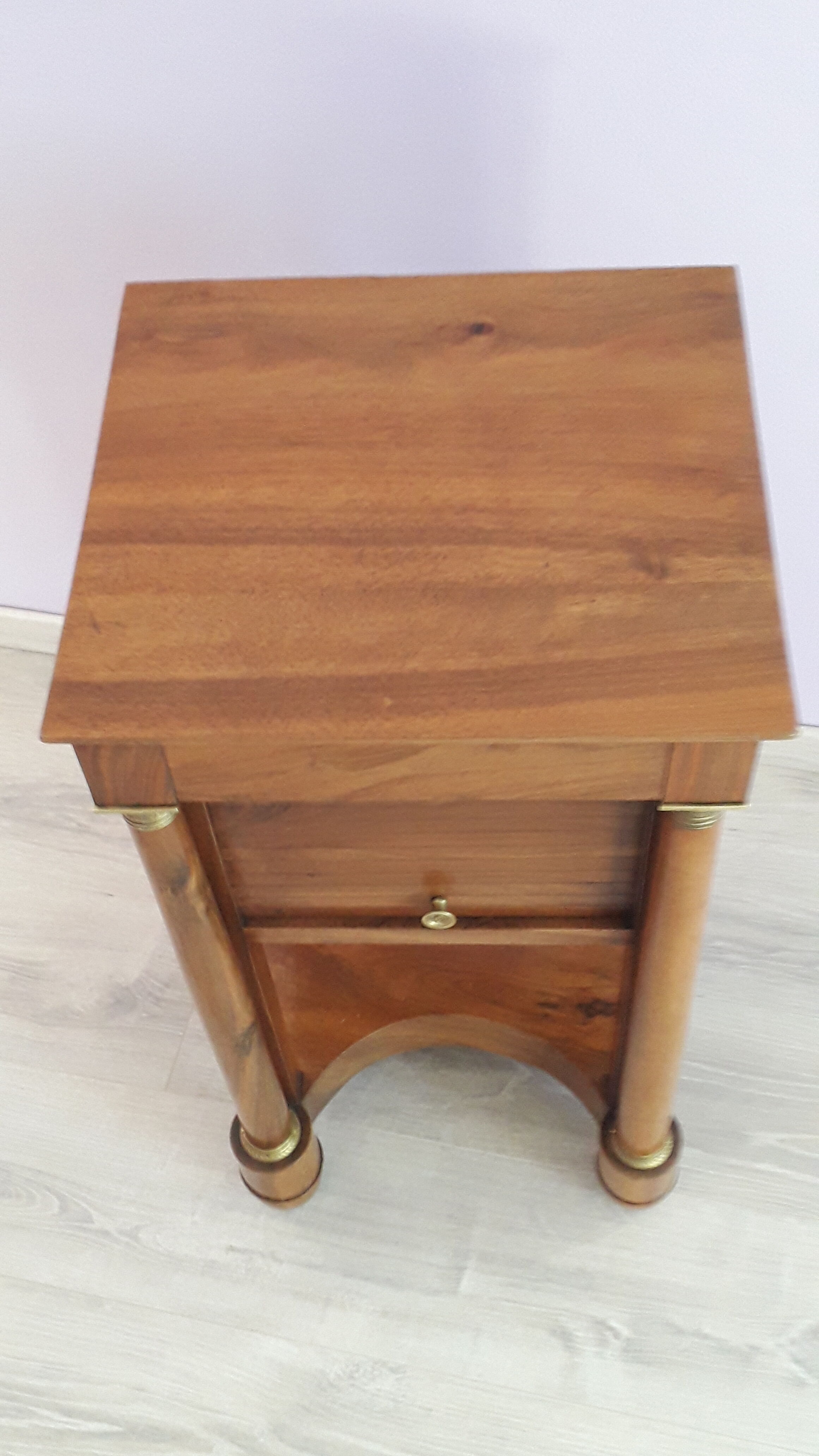 Empire period bedside table in solid walnut