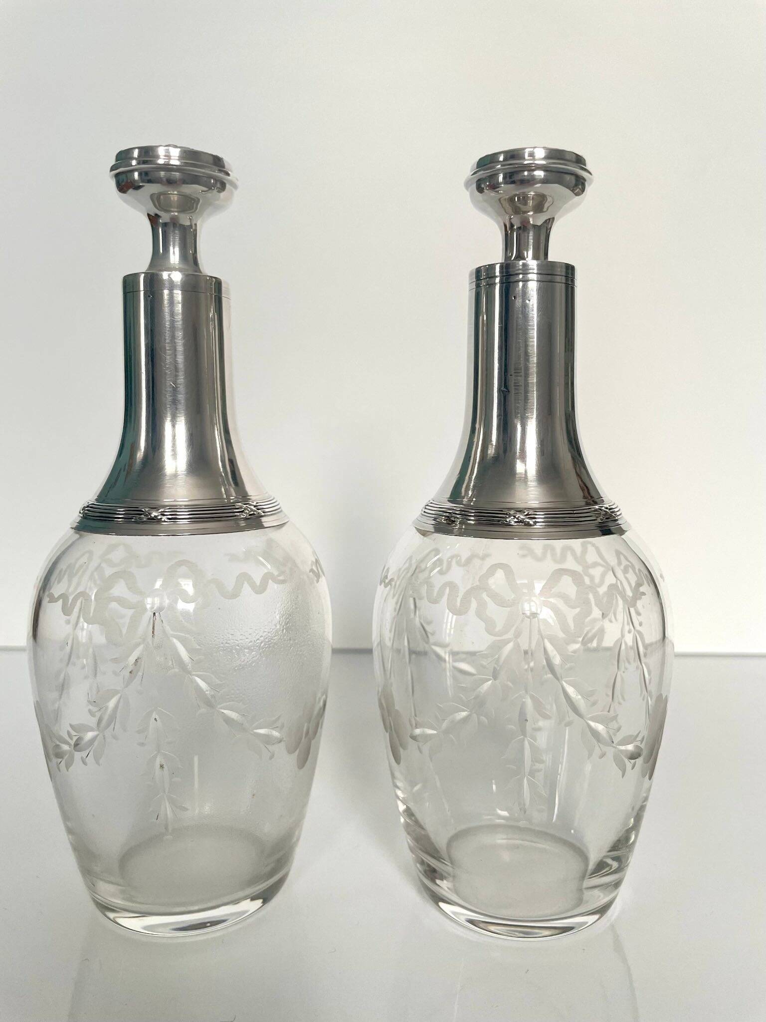 Pair of crystal and silver decanters - early 20th century