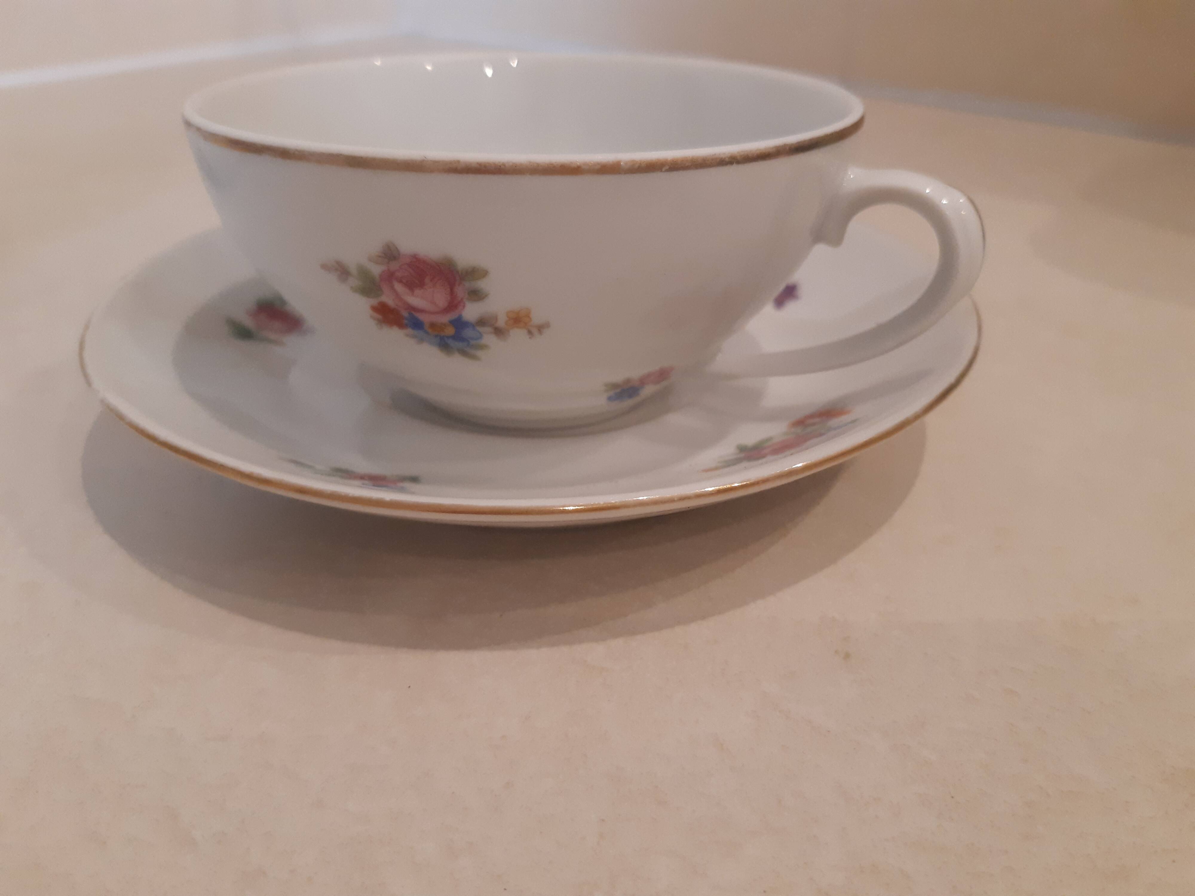 Breakfast set in white porcelain with floral decoration, 1930s.