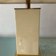 Hollywood Regency lamp in metal and brass from the 70s.