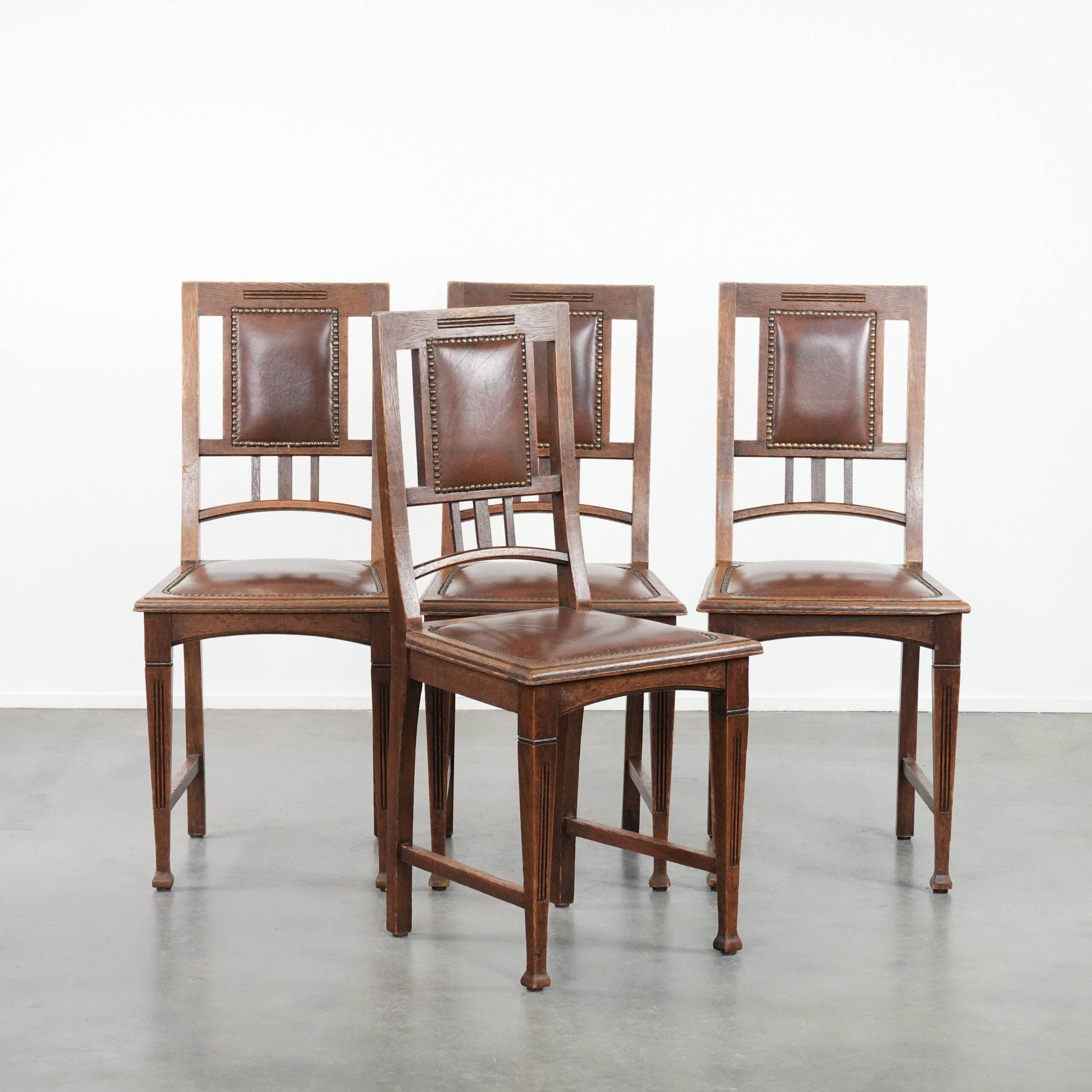 Set of four antique oak dining chairs in Art Nouveau style