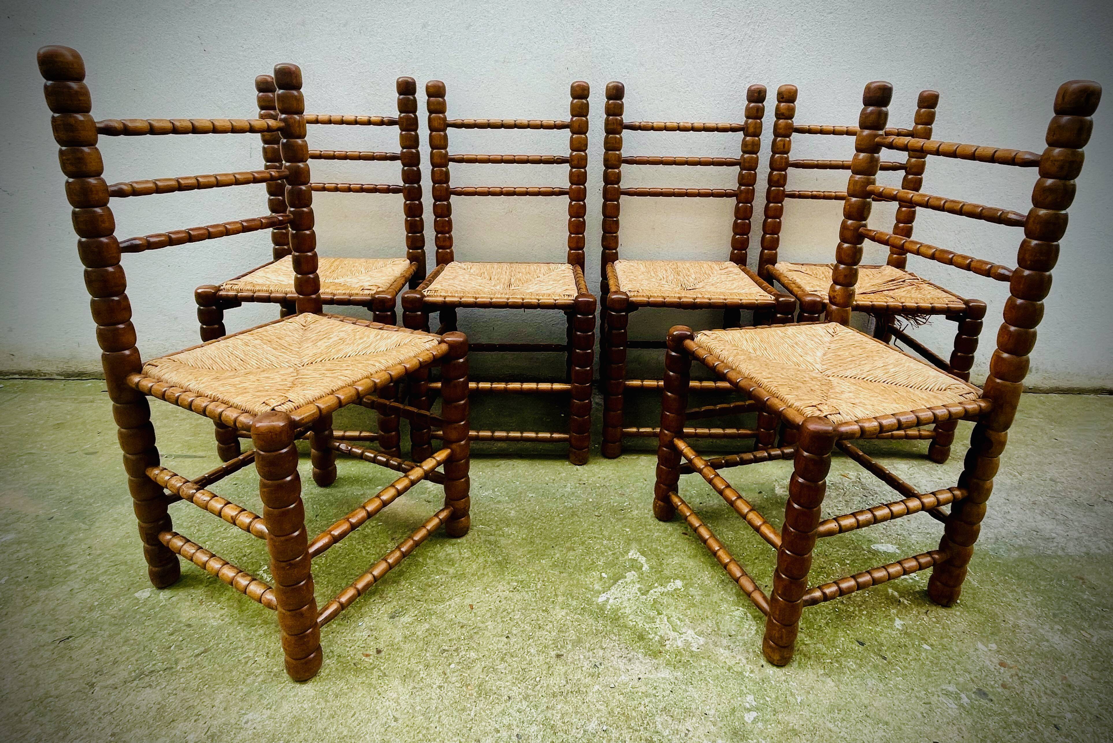 Brutalist chairs mulched in turned wood from the 60s