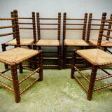 Brutalist chairs mulched in turned wood from the 60s