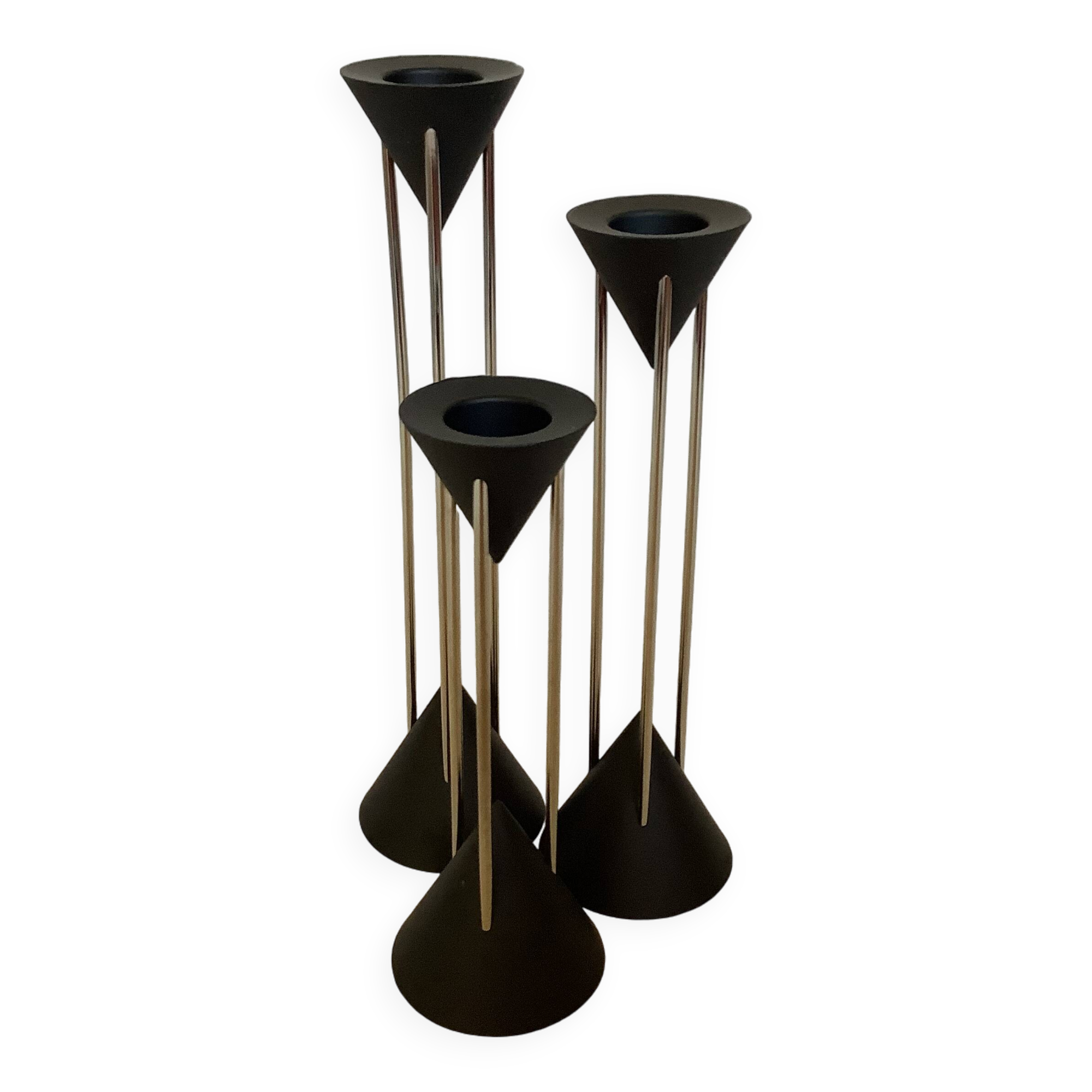 Vintage black candlestick trio