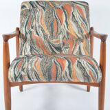 Scandinavian style armchair with terracotta patterns