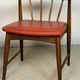 Pair of Scandinavian armchairs in teak and red faux leather – 1960s