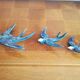 Trio iridescent ceramic wall swallows