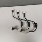 Coat hooks made of galvanized brass and raw white porcelain