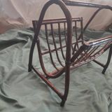 Dark rattan magazine rack