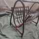 Dark rattan magazine rack