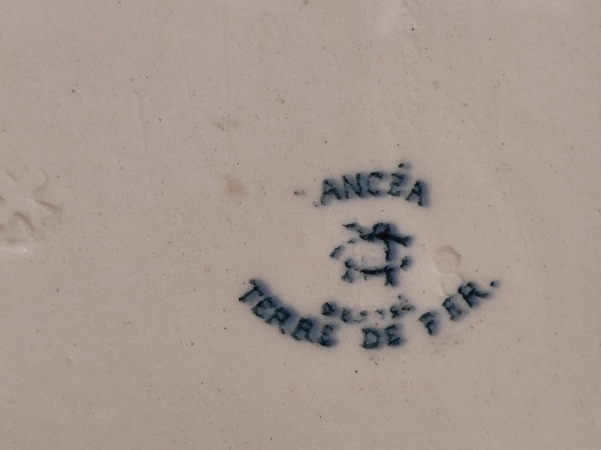 Trivet antique en porcelaine Français