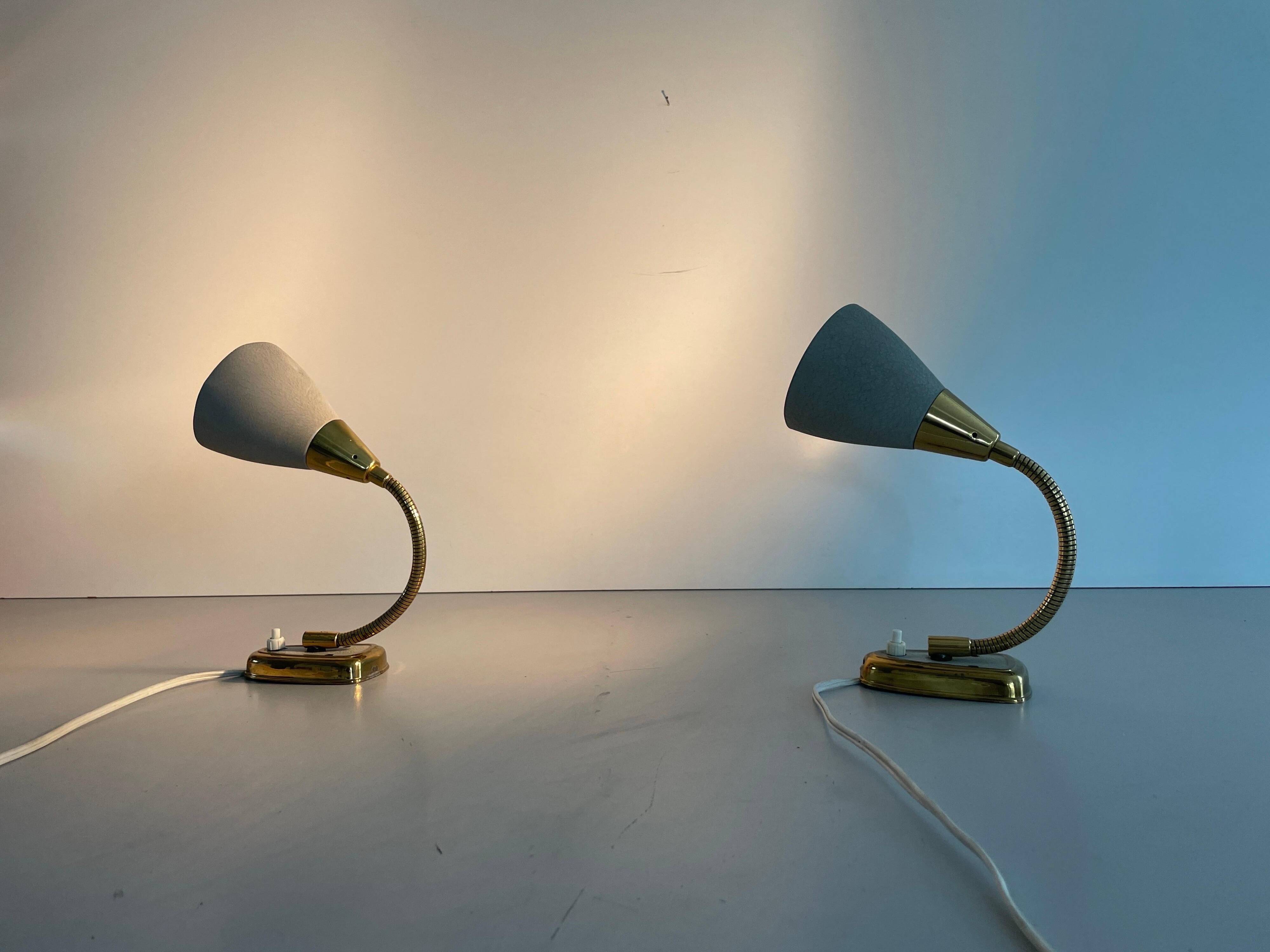 Pair of grey metal and brass wall lights, 1960s, Germany