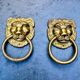2 brass lion handles in Louis XIV style