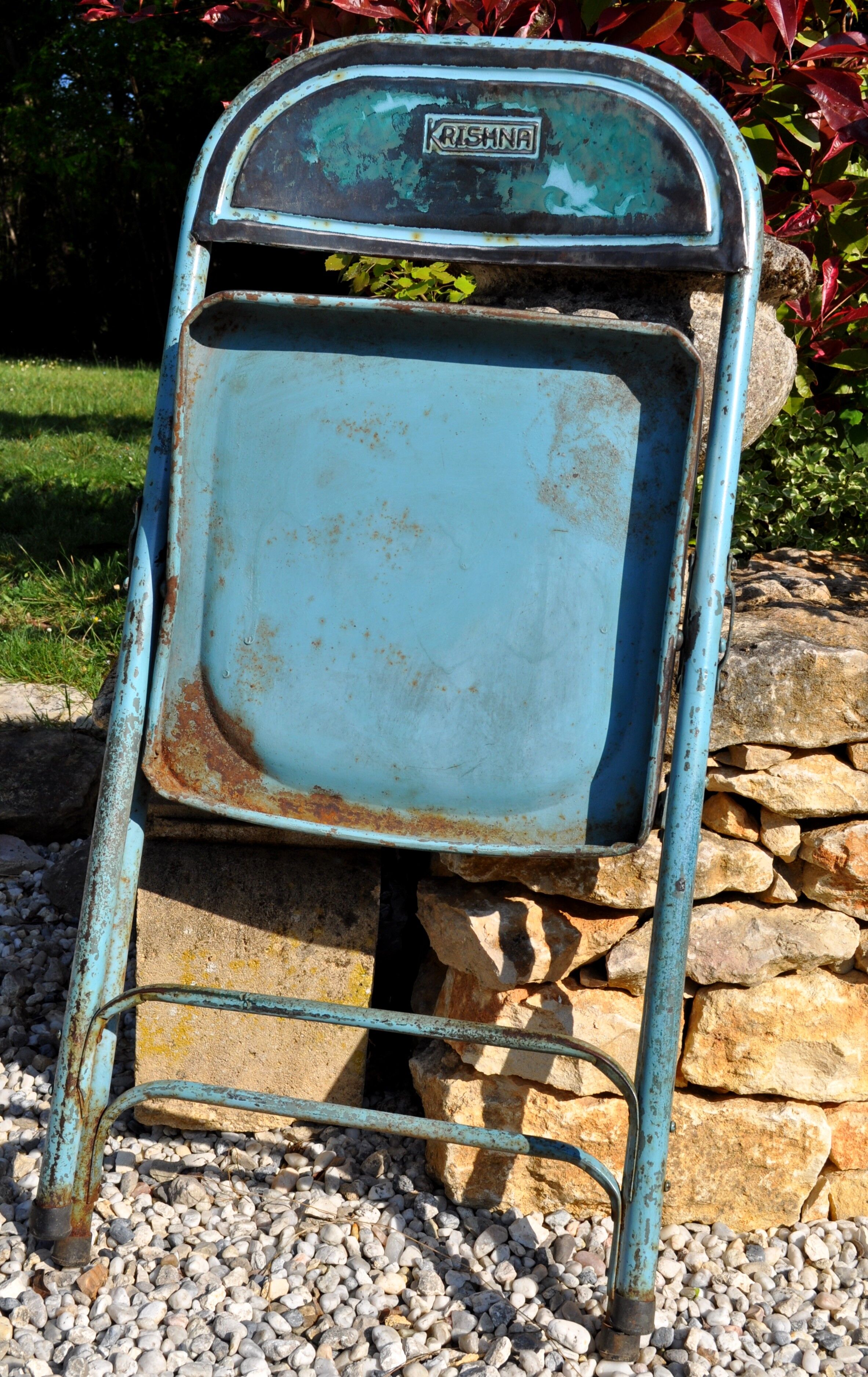 Unique folding metal chair