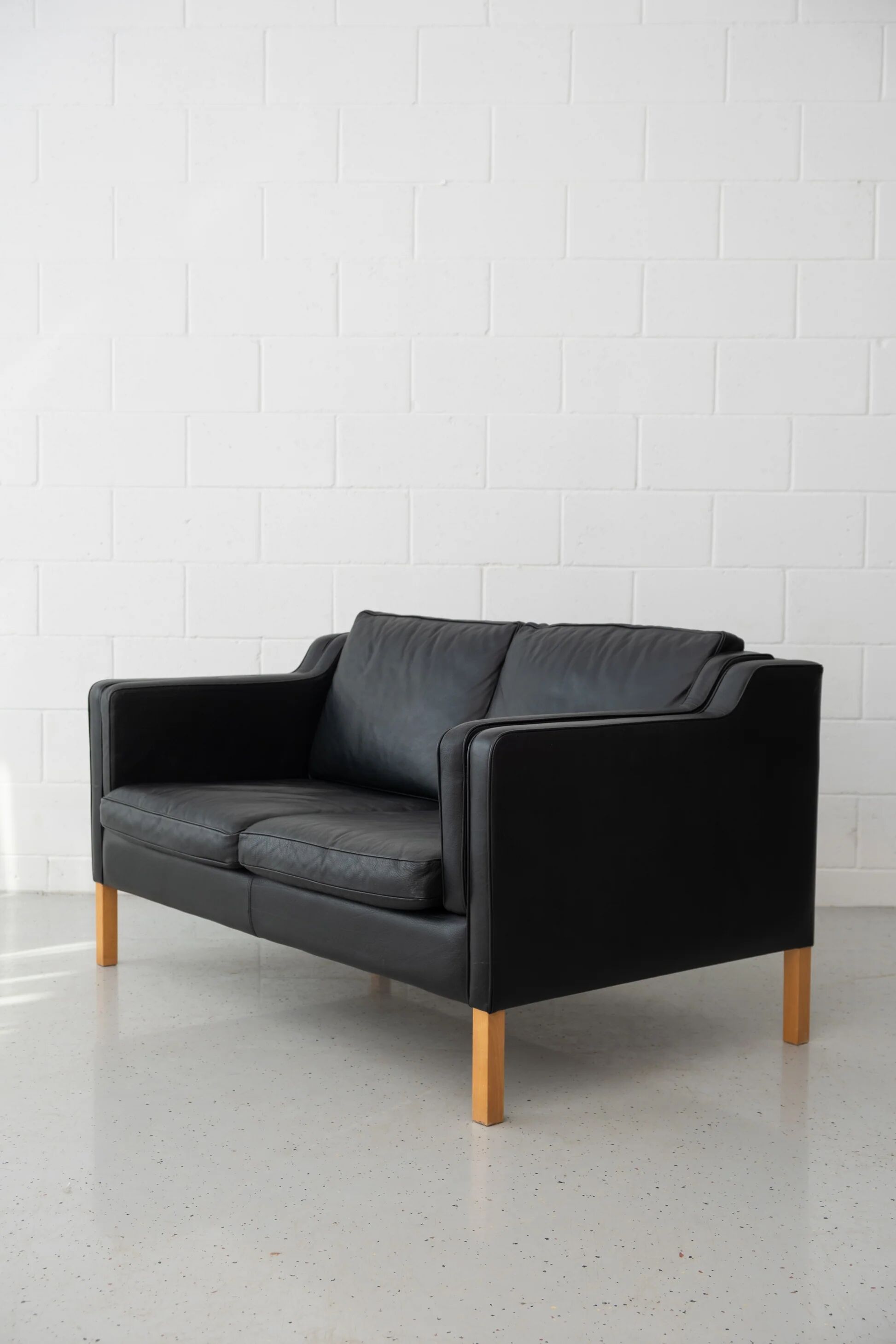 Stouby black leather sofa